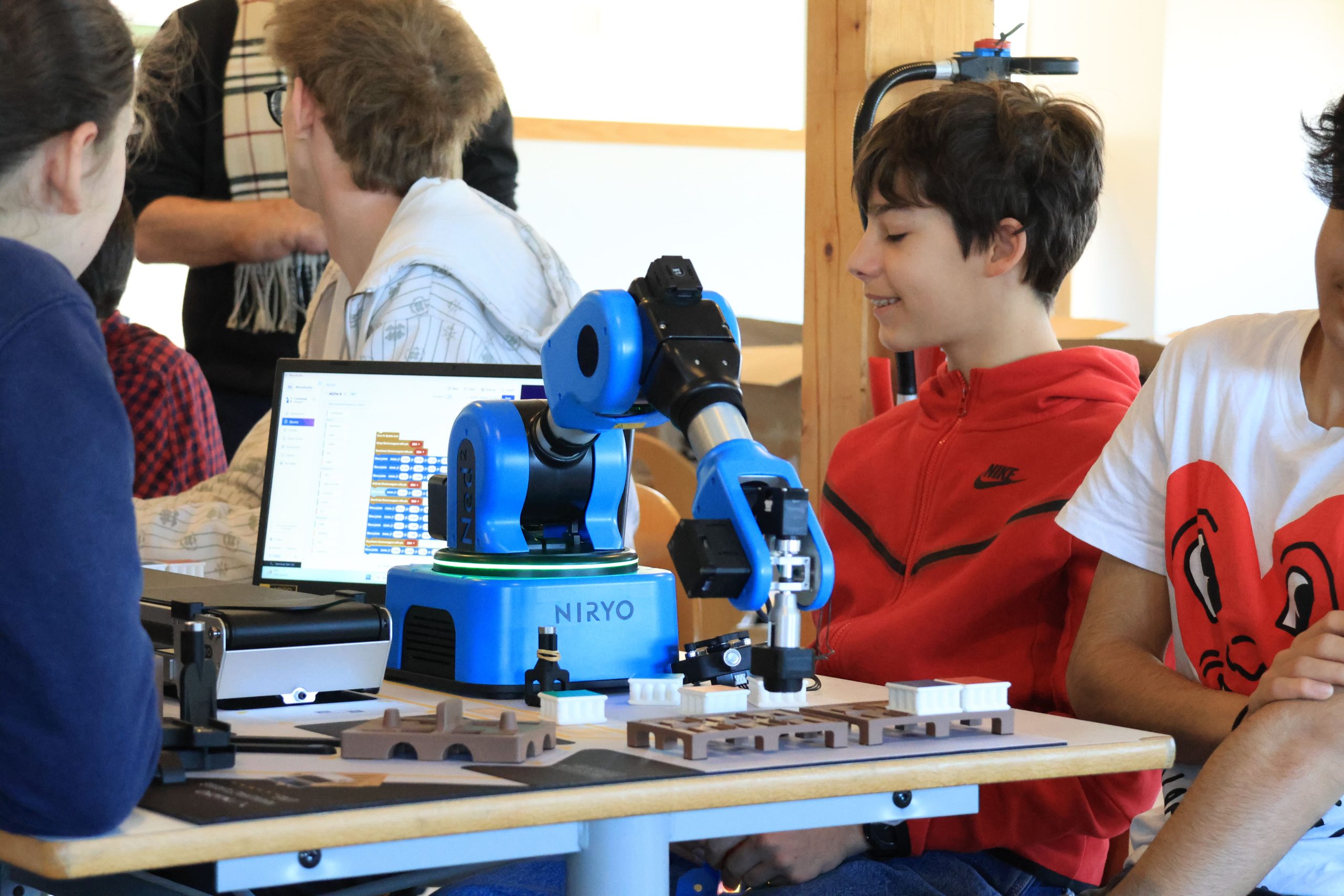 From education to business: how to build a concrete bridge through robotics